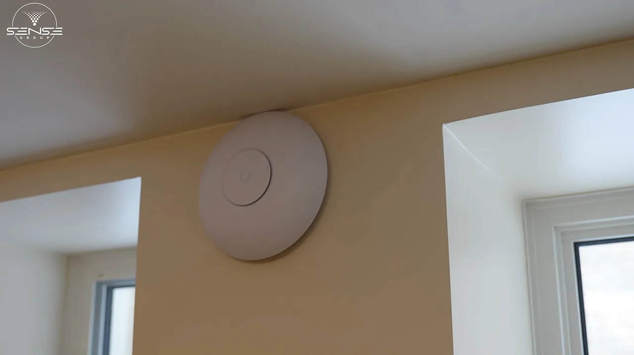 UniFi access point mounted on a church wall