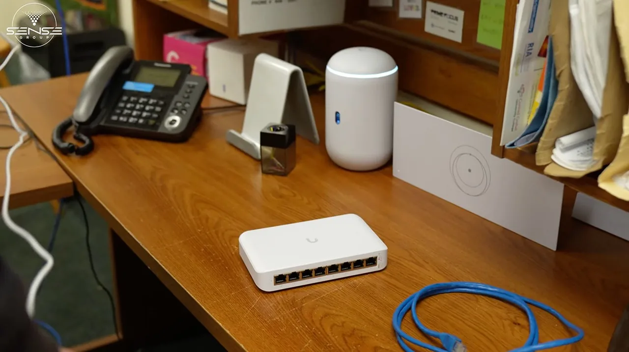 UniFi router and switch on a church office desk