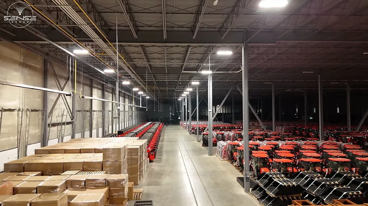 Warehouse interior with tractors and boxed inventory